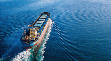 Merchant ship underway – illustration for Watermark maritime partners